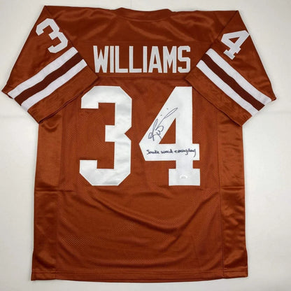Back of a brown custom football jersey with white lettering and numbers featuring williams 34 from a professional sports league