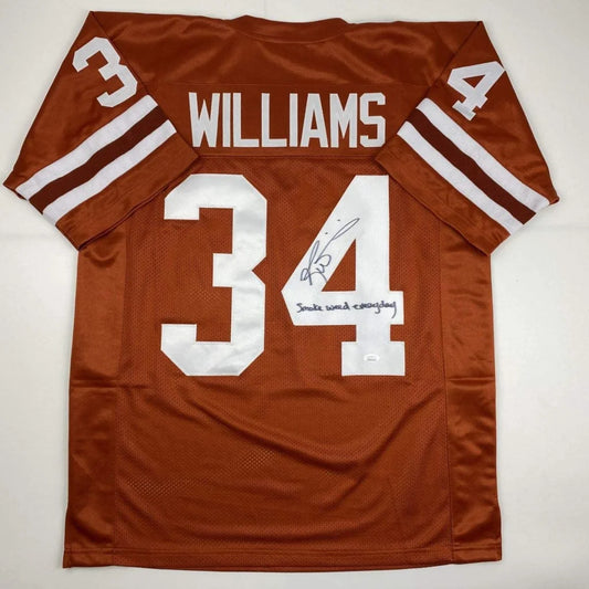 Back of a brown custom football jersey with white lettering and numbers featuring williams 34 from a professional sports league