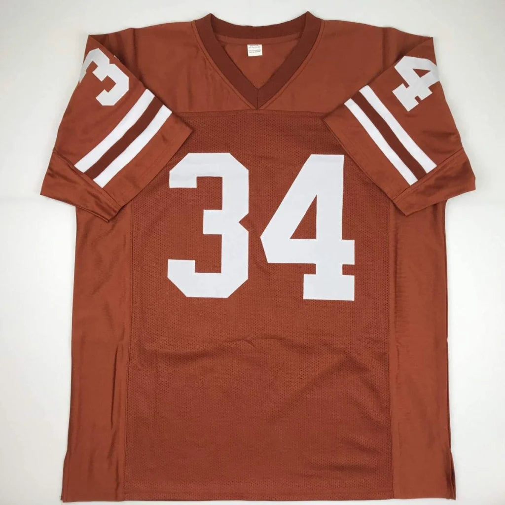 Burnt orange professional sports jersey with white 34 number and stripes for sports league