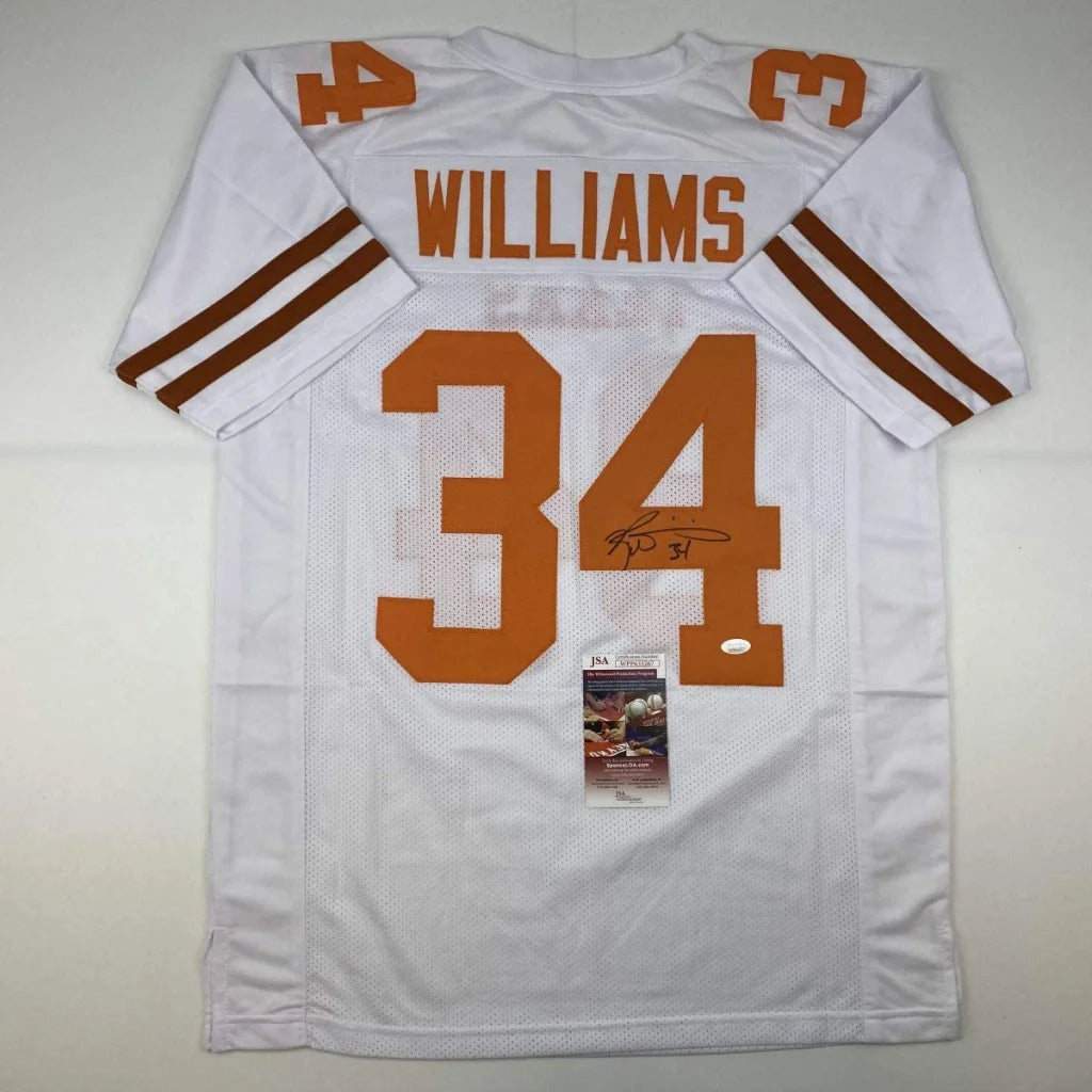 Back of autographed Ricky Williams white Texas Longhorns custom jersey with orange 34, orange Williams name, brown sleeve stripes, JSA COA, professional sports