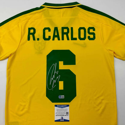 Autographed Roberto Carlos Brazil yellow retro soccer jersey with R signature, Beckett BAS COA