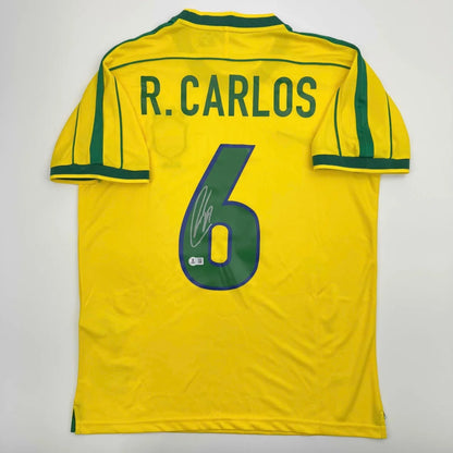 Autographed Roberto Carlos Brazil yellow soccer jersey with green trim and R name, Beckett BAS COA