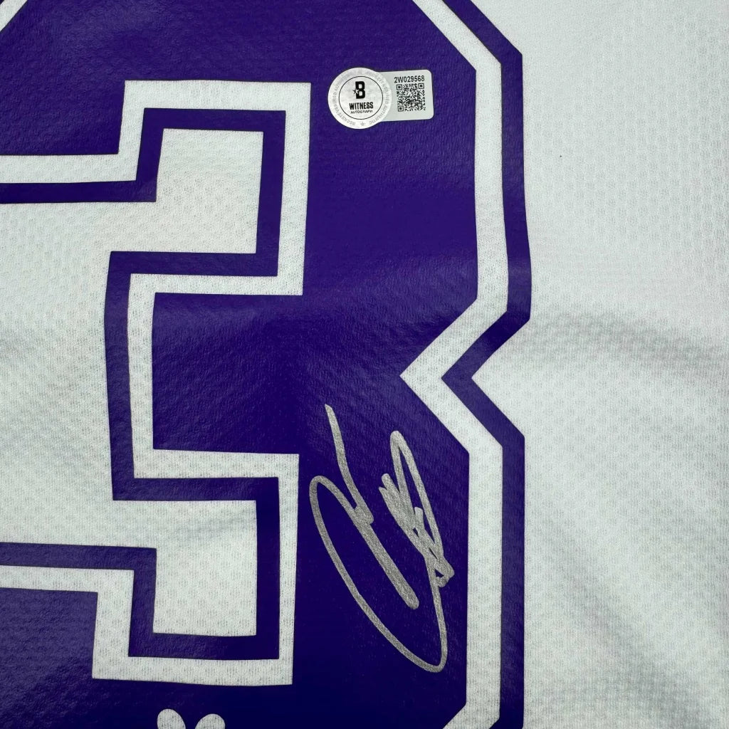 Autographed Roberto Carlos Real Madrid custom jersey with purple and white embroidered signature on gray t-shirt, Beckett BAS COA, professional sports league