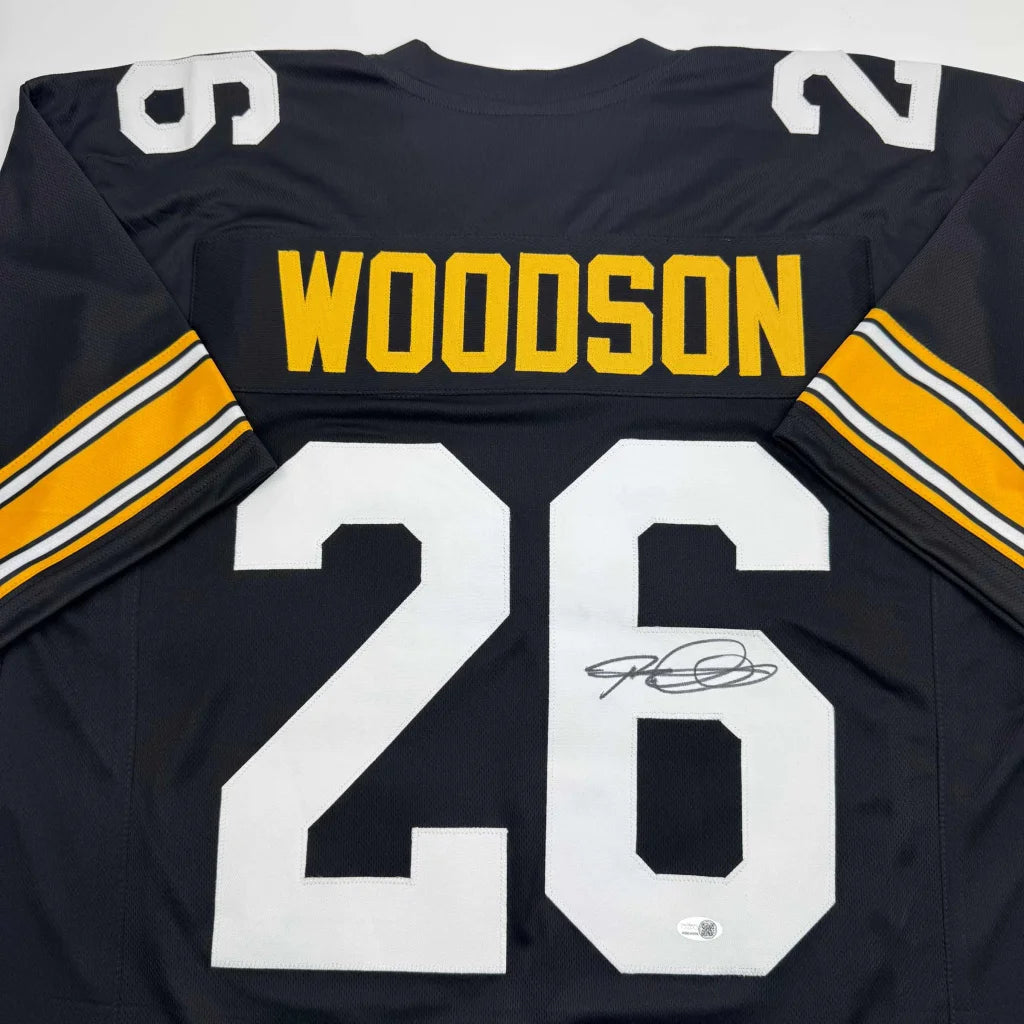 Black and gold professional sports league custom jersey with WOODSON 26 on back