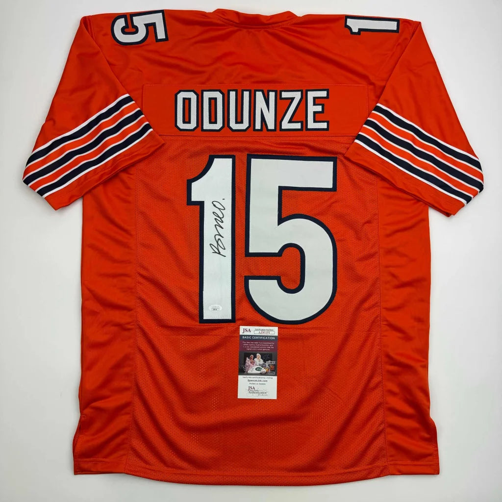 Orange custom jersey with number 15 and signature from professional sports league