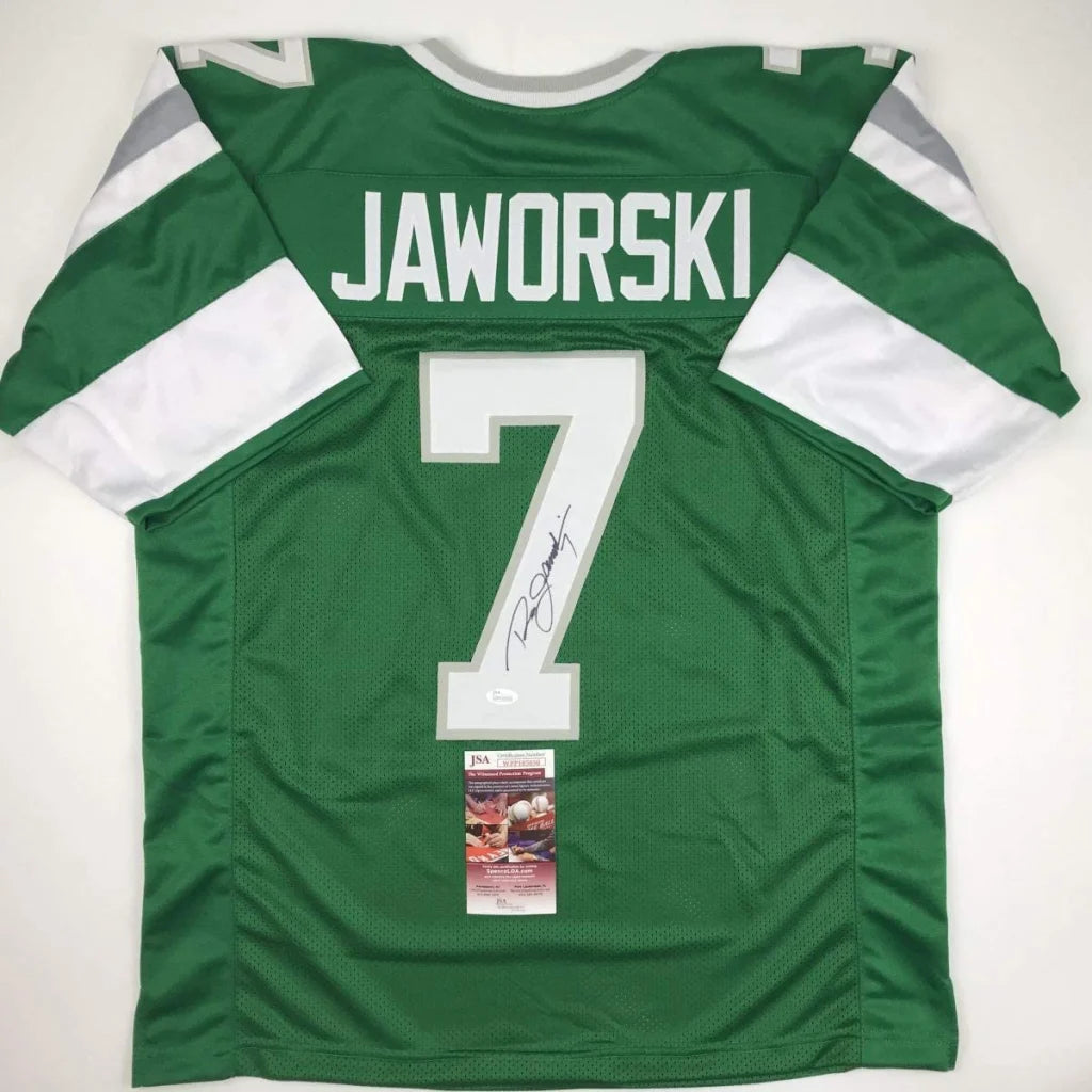 Green custom jersey with white trim and number 7 signed by Ron Jaworski, perfect for pro sports fans