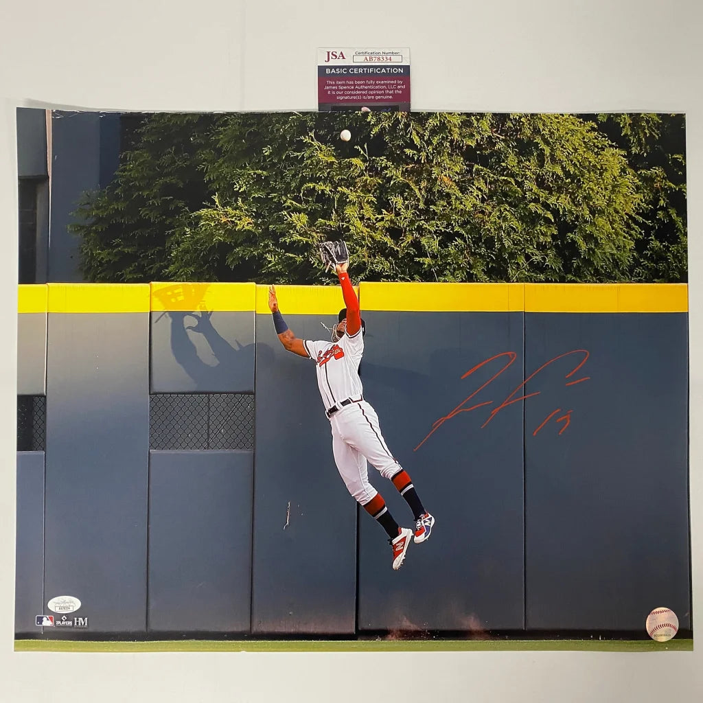 Autographed baseball photo of a player making a catch from Legendary Authenticated Baseball Catch Photo Signed by Player