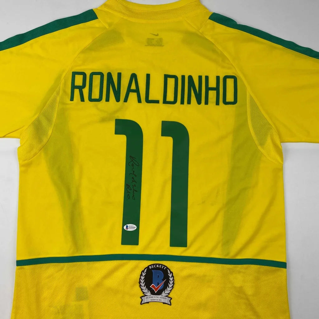 Yellow Ronaldinho signed custom jersey with autograph, Beckett sticker for pro sports fans