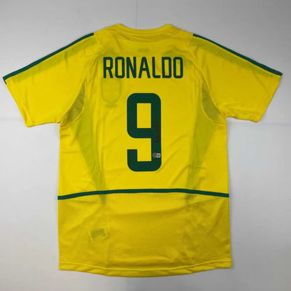 Autographed Ronaldo Nazario Brazil yellow soccer jersey with green trim