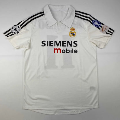 White short-sleeved collared Ronaldo custom jersey with patches, perfect for professional sports fans