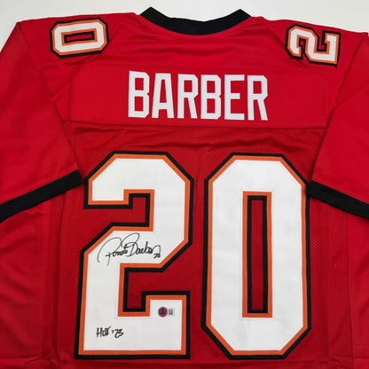 Autographed Ronde Barber HOF 23 Tampa Bay Red Football Jersey Beckett BAS COA | Certified Authentic Signed Memorabilia | vintageantiquesgifts.com