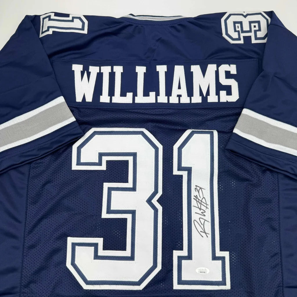 Back side of a navy blue custom roy williams dallas cowboys football jersey signed, authentic jsa coa professional sports league