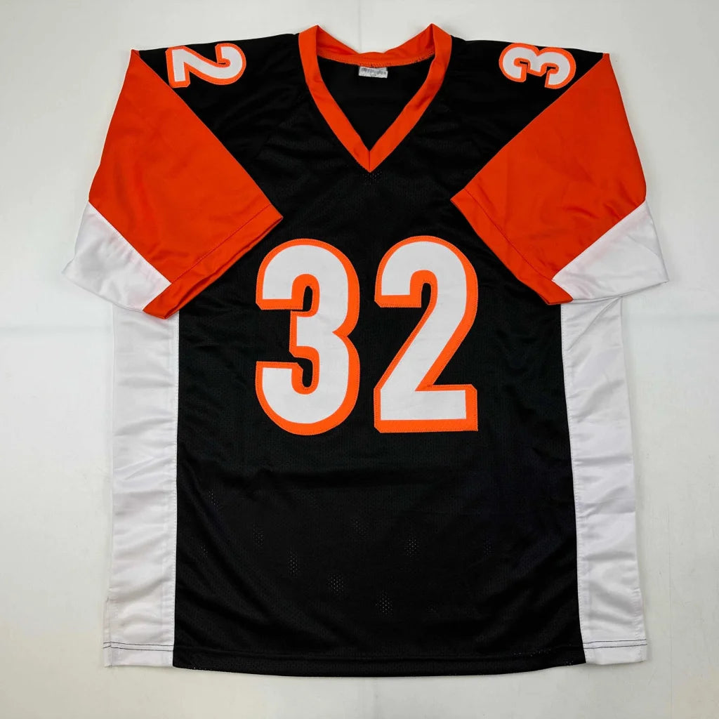 Black orange white custom football jersey with number 32 from professional sports league