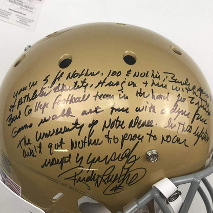 Gold football helmet with autograph and third party authentication for Rudy Ruettiger
