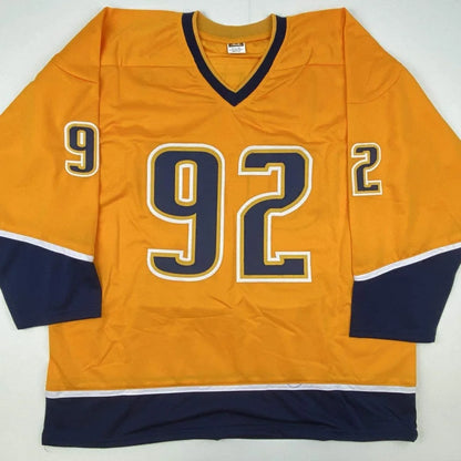 Autographed ryan johansen nashville yellow custom hockey jersey with navy blue and orange colors and gold trimmed numbers 92