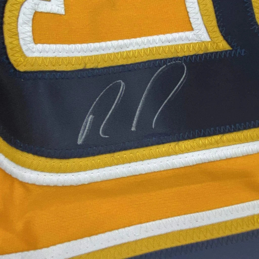 Autographed navy blue and gold custom hockey jersey with white stitched border from professional sports league player Ryan Johansen