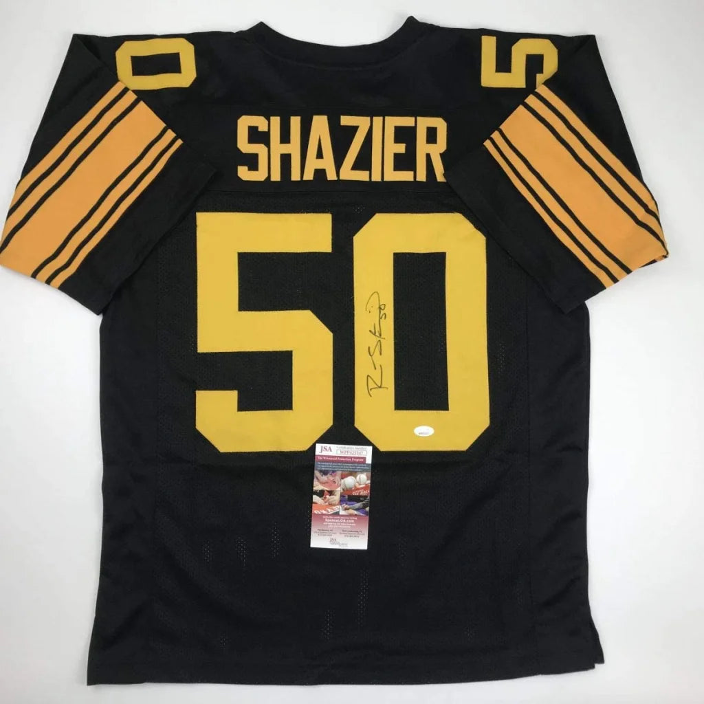 Back of a black and gold autographed ryan shazier pittsburgh color rush football custom jersey from a professional sports league