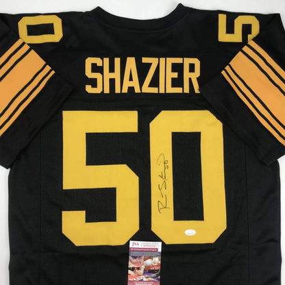 Back view of black and gold custom jersey with shazier 50 in yellow and orange sleeve stripes for professional sports league