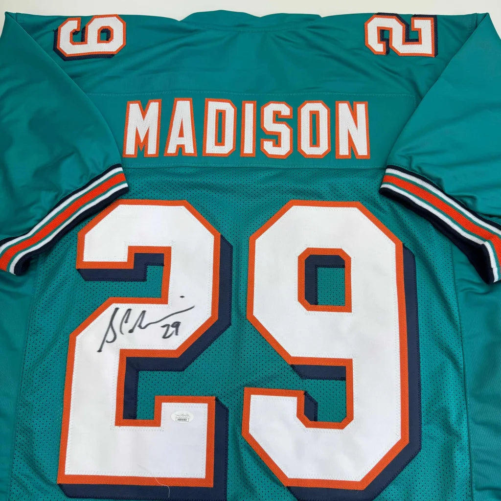 Autographed Sam Madison custom Miami Dolphins teal jersey with name and number 29