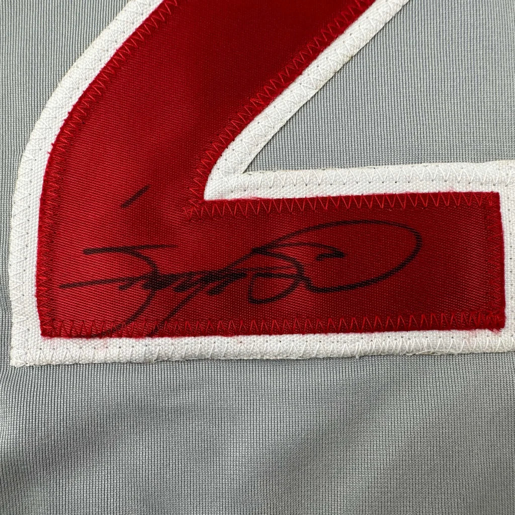 Autographed red custom jersey from a professional sports league display