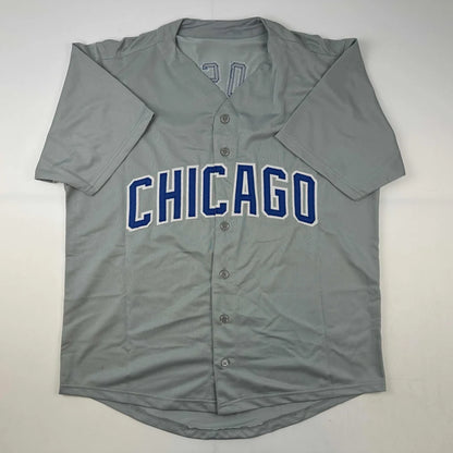 Gray short-sleeved baseball jersey with CHICAGO in blue and white, perfect for custom sports fans