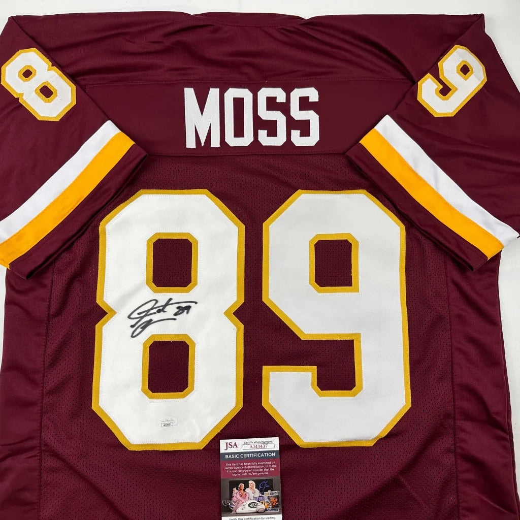 Back side of a custom maroon and gold washington redskins professional sports jersey signed by santana moss with white number 89