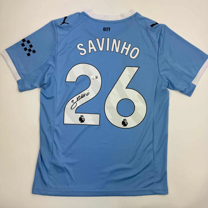 Back of autographed Savinho Manchester City light blue jersey, number 26, Beckett COA