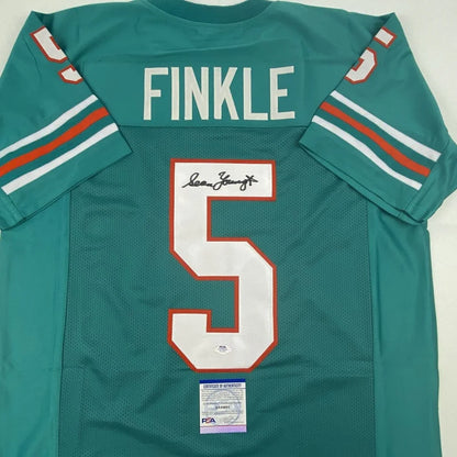 Autographed teal Miami Dolphins Finkle #5 jersey signed by Sean Young