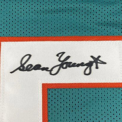 Autographed Sean Young Ray Finkle teal custom jersey with signature patch, PSA/DNA COA