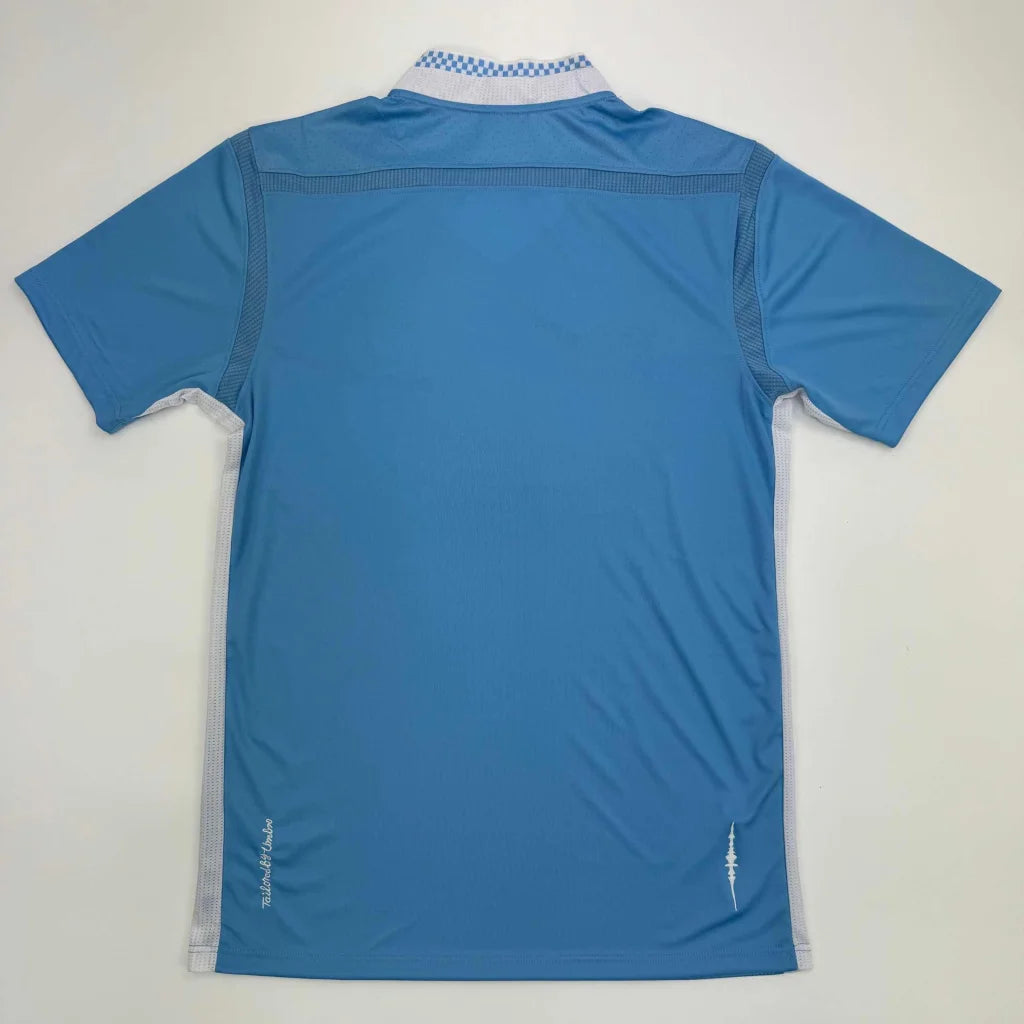 Light blue short-sleeved polo shirt with checkered collar, third party authentication