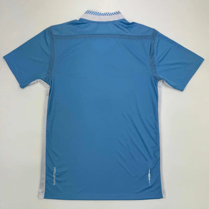 Light blue short-sleeved polo shirt with checkered collar, third party authentication