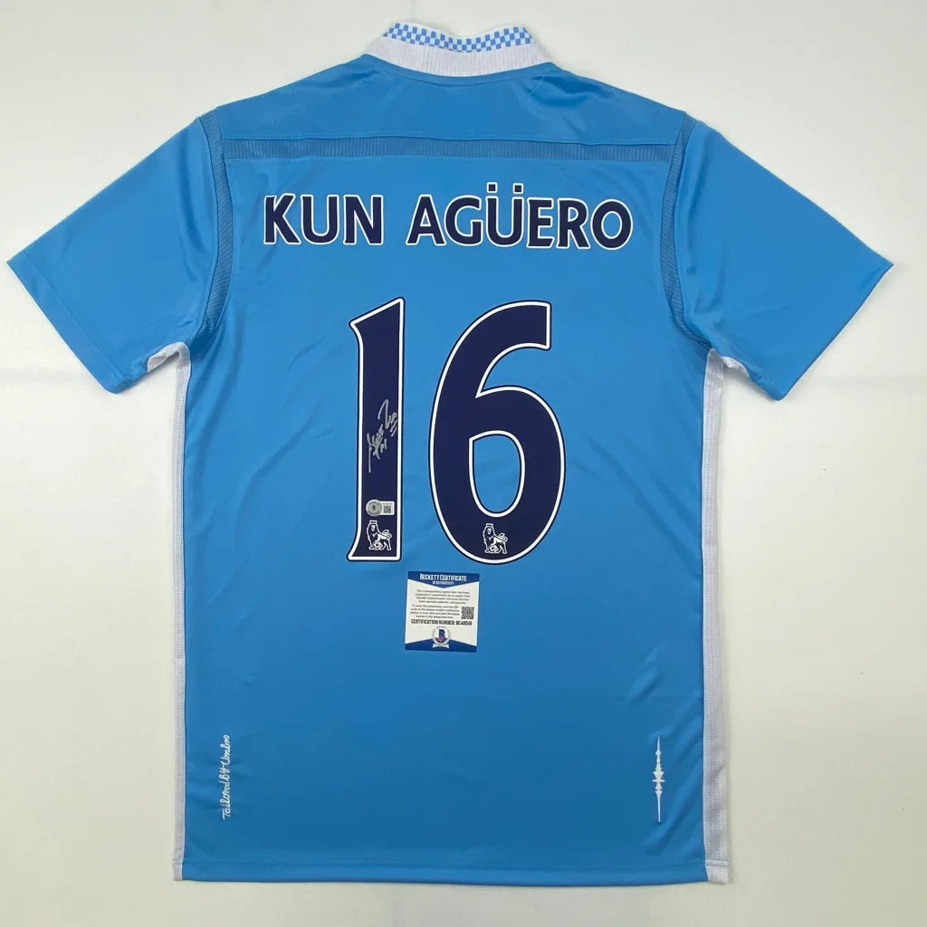 Light blue Kun Aguero signed soccer jersey with third party authentication and 16 on back