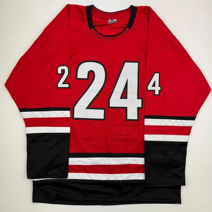 Red and black custom jersey with white stripes and number 24 for professional sports league