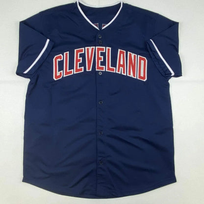 Autographed Shane Bieber Cleveland custom jersey in navy blue with red arched lettering