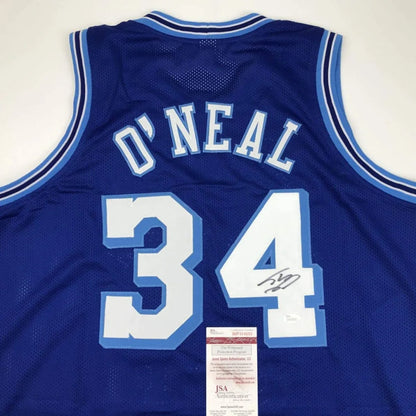 Back view of a blue mesh custom jersey with white and light blue lettering o neal 34 signed for professional sports league use
