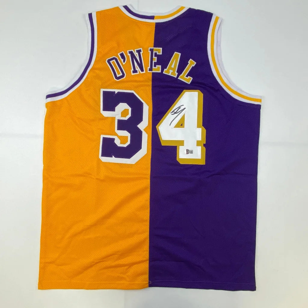 Back of autographed custom los angeles lakers split orange purple professional sports jersey with o neal 34 and signature 4