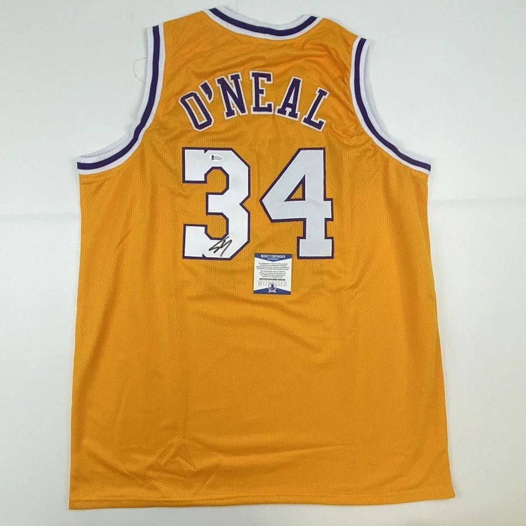 Autographed Shaquille ONeal golden custom jersey with number 34, Beckett COA