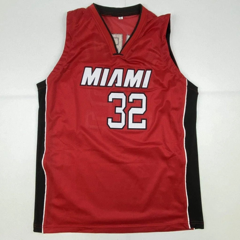 Red basketball jersey with black trim and white numbers for professional sports league fans