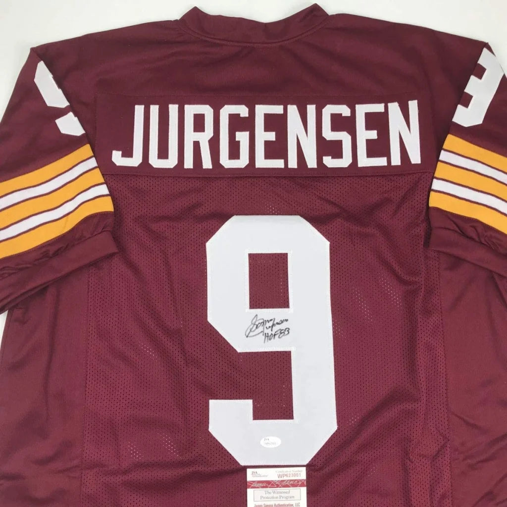 Maroon maroon custom jersey with white number 9 and yellow white sleeve stripes signed by Sonny Jurgensen professional sports league