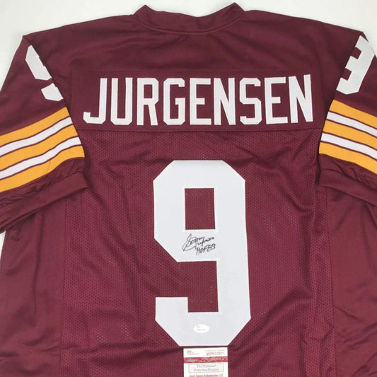 Maroon maroon custom jersey with white number 9 and yellow white sleeve stripes signed by Sonny Jurgensen professional sports league