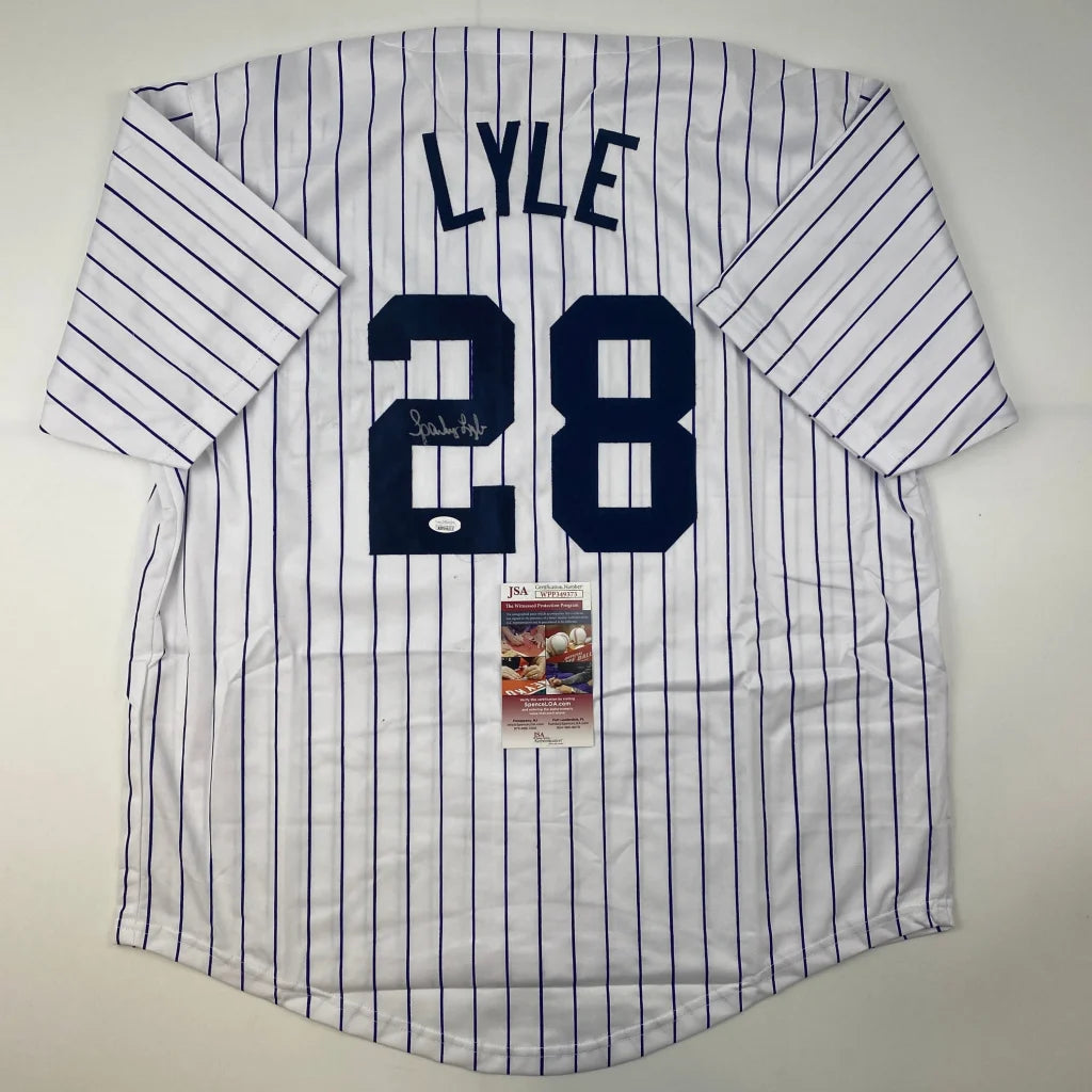Autographed Sparky Lyle custom New York pinstripe jersey with navy number 28