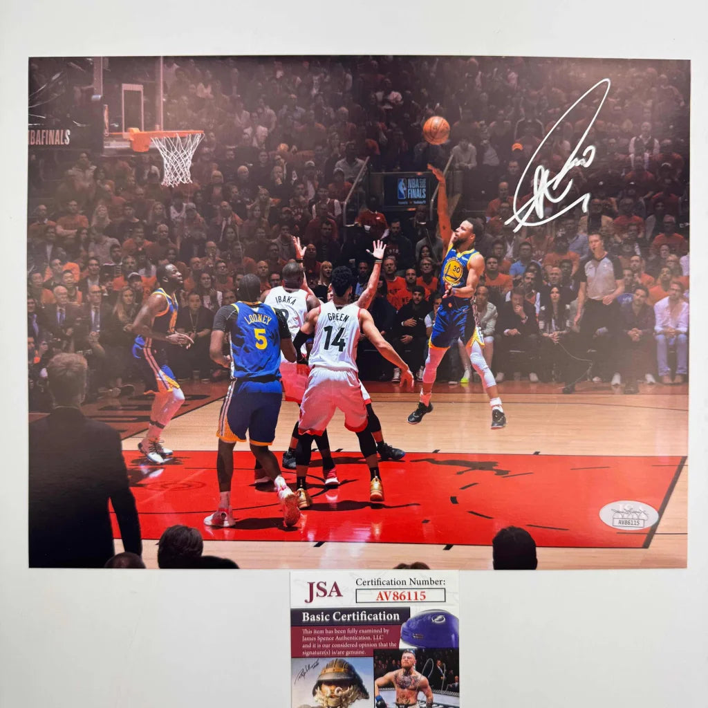 Autographed Stephen Curry basketball action photo with third party authentication