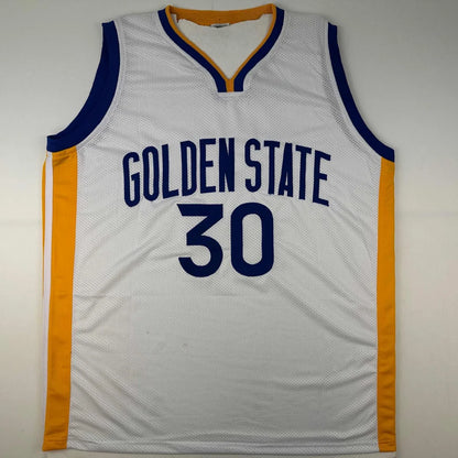 White basketball jersey with blue and gold trim from authentic professional sports league custom jersey