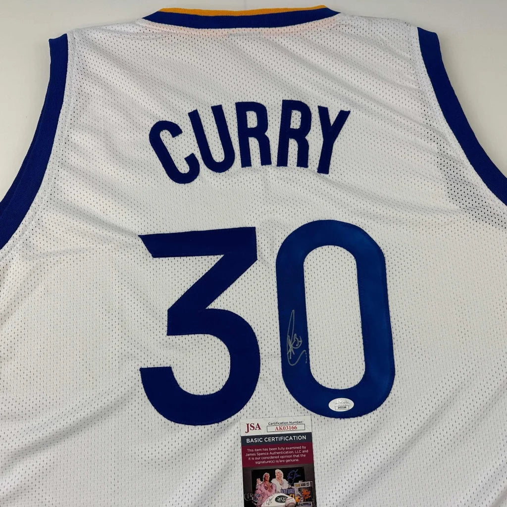 White professional sports league custom jersey with Curry 30 autograph and JSA sticker