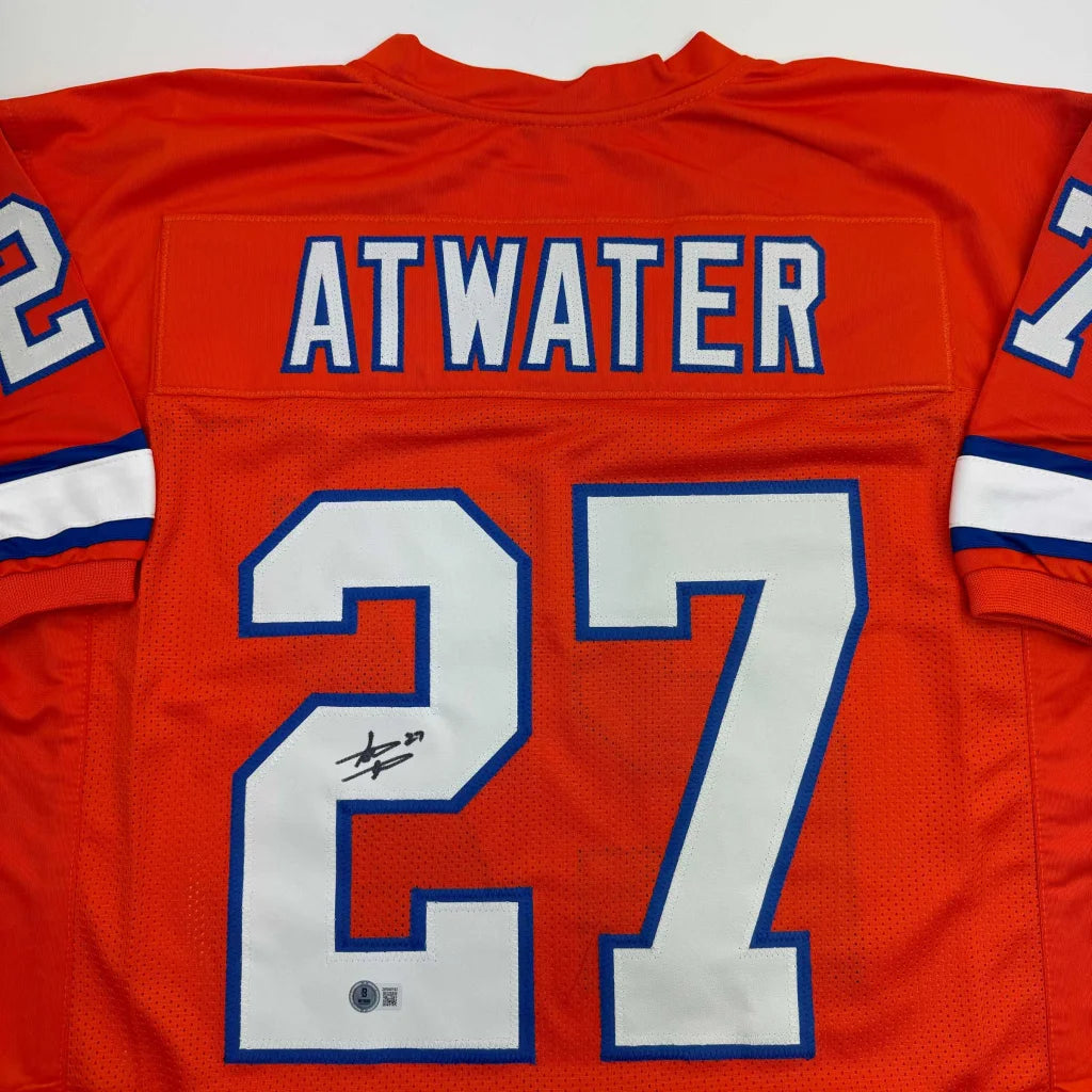 Orange custom jersey with ATWATER and 27 from a professional sports league collectible