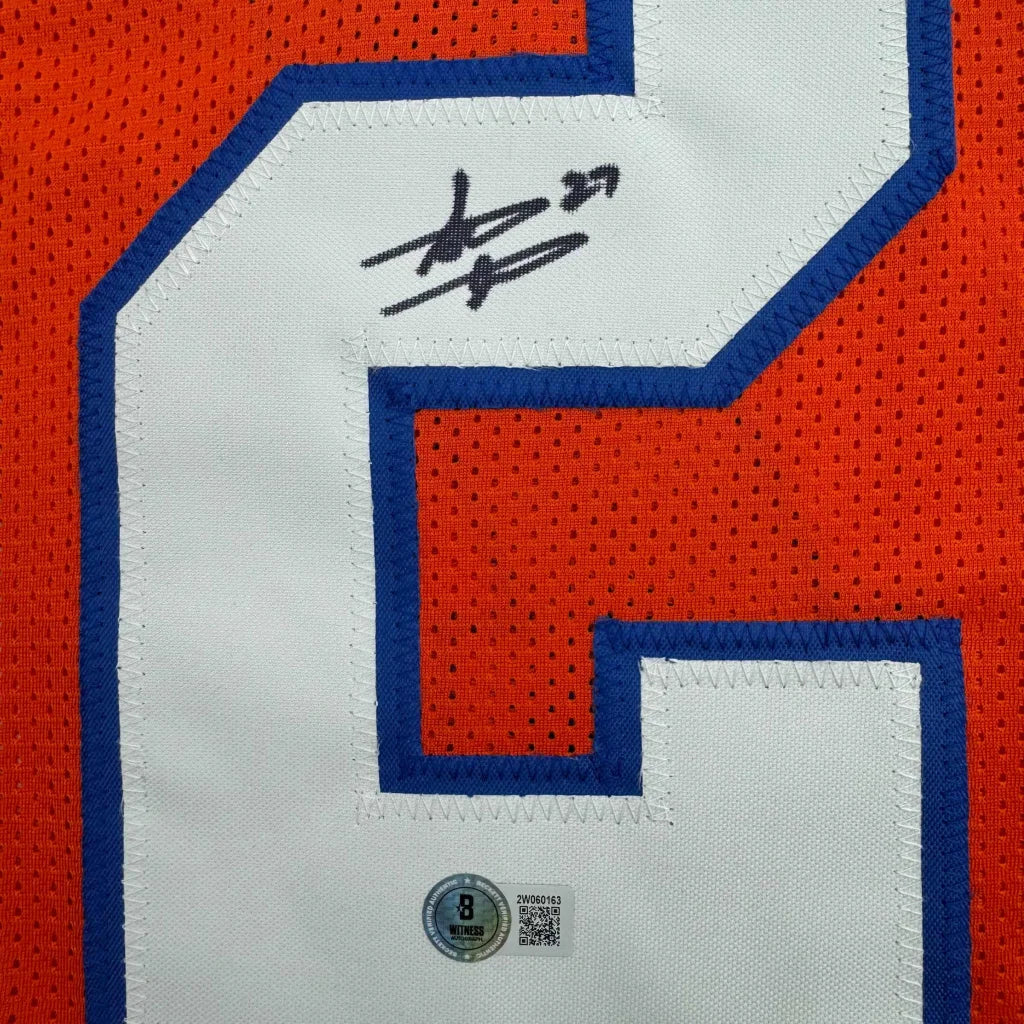 Autographed orange custom jersey from a professional sports league collectible
