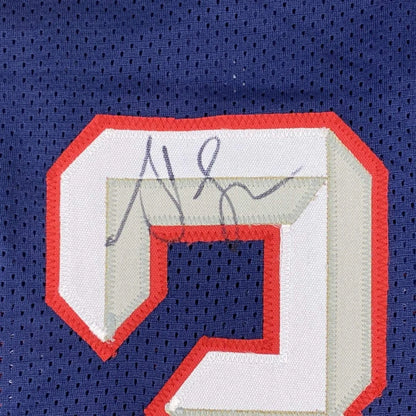 Autographed blue custom jersey with number 2 in red and white trim for professional sports fans