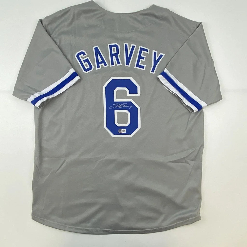Steve Garvey signed gray custom jersey with blue lettering for pro sports fans
