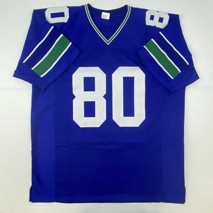 Blue custom sports jersey with white 80 and green striped sleeves, perfect for pro sports fans