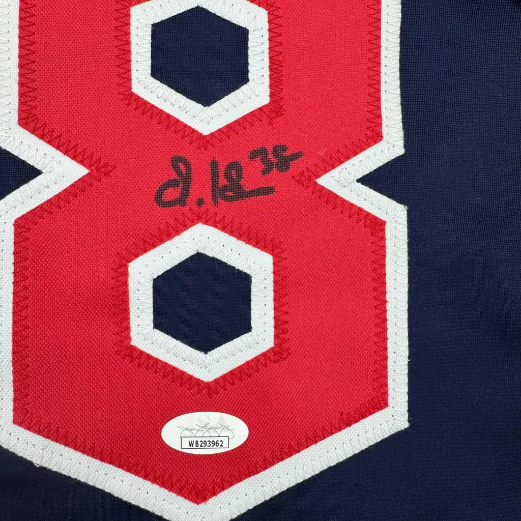 Autographed red and white number 8 custom jersey from a professional sports league